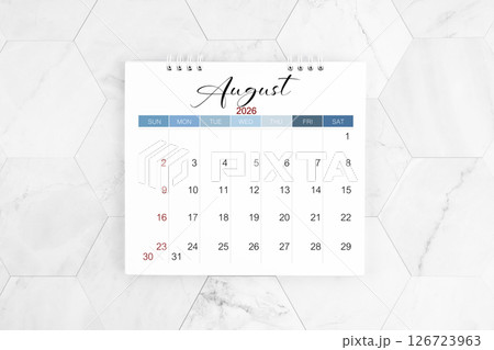 August 2026 blank desk calendar on marble table, Flat lay. 126723963