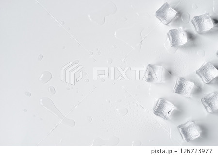 Melting ice cubes on a white background Melting ice cubes on a white background 126723977