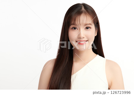 A beautiful young Asian woman with clean, fresh skin against a white background. Skincare, facial treatment, cosmetology, beauty, and spa. An elegant portrait of an Asian woman. A beautiful young Asian woman with clean, fresh skin against a white background. Skincare, facial treatment, cosmetology, beauty, and spa. An elegant portrait of an Asian woman. 126723996