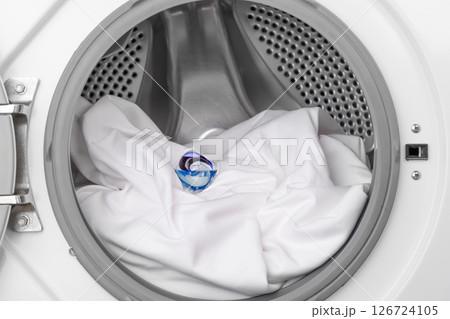 liquid capsule for washing in a washing machine of white clothes liquid capsule for washing in a washing machine of white clothes 126724105