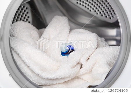 liquid capsule for washing in a washing machine of white clothes 126724106