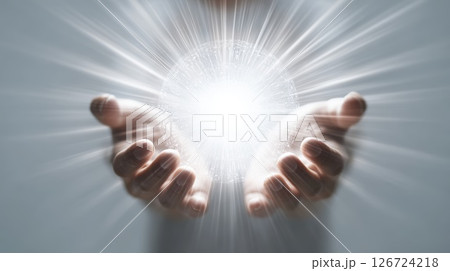 Glowing Energy Sphere Held in Hands in Abstract Concept Glowing Energy Sphere Held in Hands in Abstract Concept 126724218