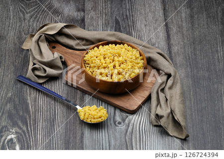 Italian Food background on wooden table. Top view. Italian Food background on wooden table. Top view. 126724394