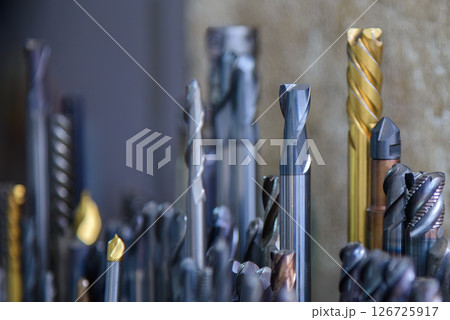 Close-up scene the used flat nose or square solid end mill tools. 126725917