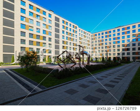 A modern urban complex designed to offer a play area alongside various beautiful sculptures A modern urban complex designed to offer a play area alongside various beautiful sculptures 126726789