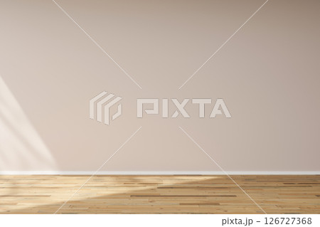 This empty room features a bare floor and plain walls, providing an ideal blank canvas for interior design. Natural light floods in, highlighting the potential for creative decor This empty room features a bare floor and plain walls, providing an ideal blank canvas for interior design. Natural light floods in, highlighting the potential for creative decor 126727368