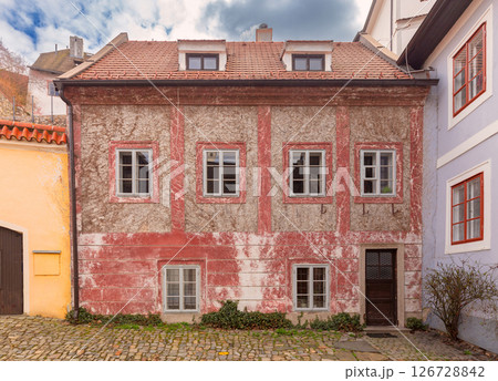 Historic red facade house in Cesky Krumlov, Czech Republic 126728842