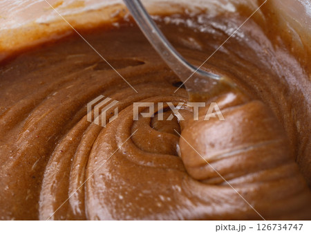 Creamy Gingerbread Dough Being Mixed with Spoon Close-Up Creamy Gingerbread Dough Being Mixed with Spoon Close-Up 126734747