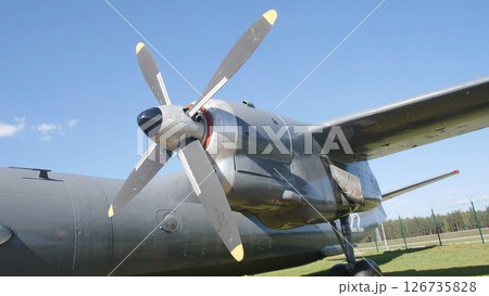 Historic Military Aircraft Displayed Against a Clear Blue Sky With a Strong Emphasis on the Intricate Propeller Design During Daylight Historic Military Aircraft Displayed Against a Clear Blue Sky With a Strong Emphasis on the Intricate Propeller Design During Daylight 126735828