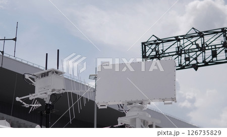 Advanced Radar System Operates Under a Cloudy Sky at a Testing Facility, Demonstrating Technology for Tracking and Monitoring 126735829
