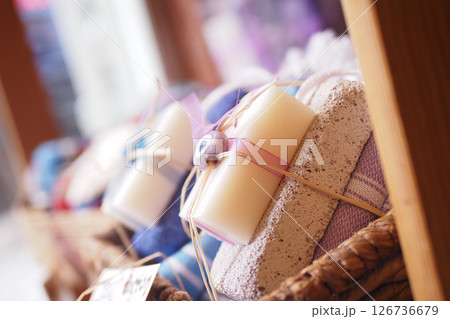 Colorful handmade soaps displayed in a cozy store 126736679