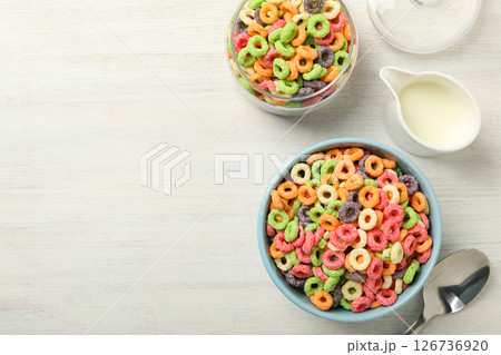 Colorful cornflakes, concept of tasty breakfast, morning food, space for text Colorful cornflakes, concept of tasty breakfast, morning food, space for text 126736920