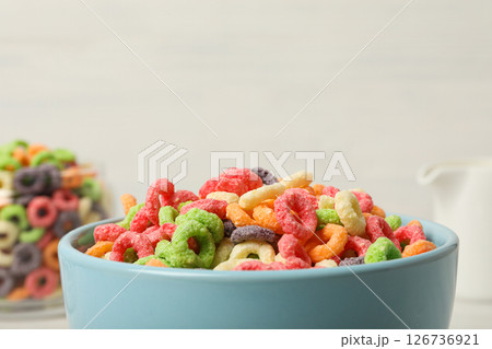 Colorful cornflakes, concept of tasty breakfast, morning food, space for text 126736921