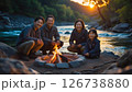 家族で川原でキャンプをしている様子 126738880