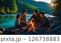 家族で川原でキャンプをしている様子 126738883