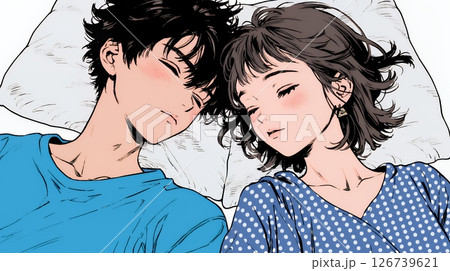 寄り添いながら穏やかに眠る若いカップル