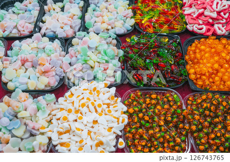 assortment of sweets marmalade and chewable candies on the counter at a candy store in oriental market 126743765