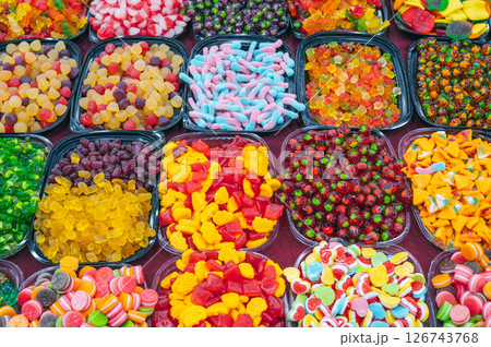 sweets marmalade and chewable candies on the counter at candy store in oriental market 126743768