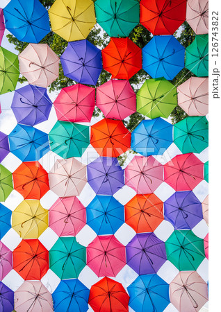 multicolored bright colorful umbrellas decoration on festive street in Tashkent 126743822