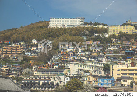 March 28 2025 Urban Neighborhood with Apartment Towers and Hillside Residences 126743900