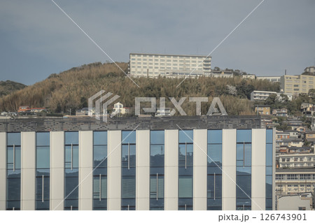 March 28 2025 Urban Neighborhood with Apartment Towers and Hillside Residences 126743901