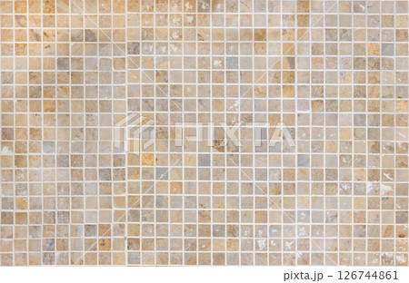 Light brown mosaic tiles composed of small square pieces 126744861