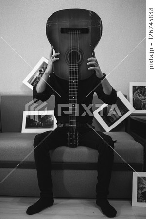 Artistic Strings: The Guitarist in the Lens 126745838