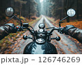 Biker rides on road. First-person view. 126746269