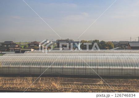March 28 2025 Architecture with Agricultural Greenhouse on a Bright Sunny Day March 28 2025 Architecture with Agricultural Greenhouse on a Bright Sunny Day 126746834