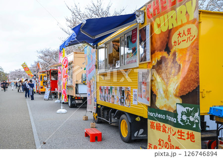 March 27 2025 Food Stalls Under Cherry Blossom Trees During a Cultural Festival, Japan 126746894