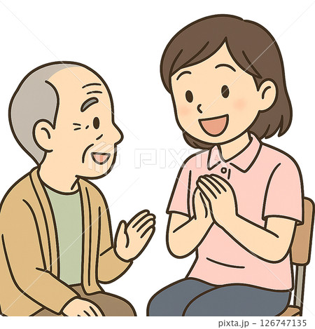 笑顔で会話を楽しむ介護士と男性 126747135