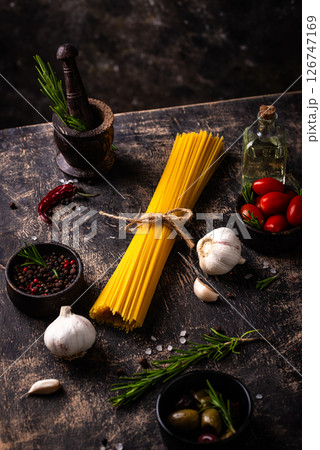 Italian food background with spaghetti, tomato and spices 126747169