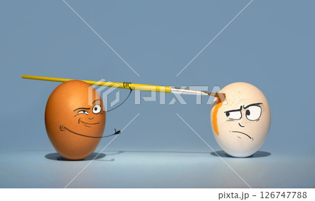 Two chicken eggs on a blue background, white and brown, are preparing for the Easter holiday, paint each other with a brush with a suspicious and sly look Two chicken eggs on a blue background, white and brown, are preparing for the Easter holiday, paint each other with a brush with a suspicious and sly look 126747788