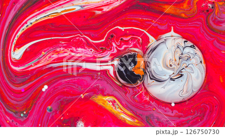 Vibrant abstract macro of swirling red, white, and black paint. Dynamic fluid motion with marbled textures, ideal for backgrounds or modern art design. 126750730