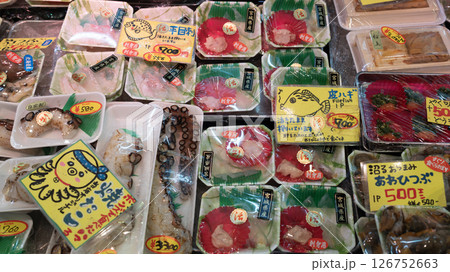 Sashimi of shellfish and fish is on sale In Sendai Asaichi Morning Market.  Sendai asaichi morning market is one of old market in sendai 126752663