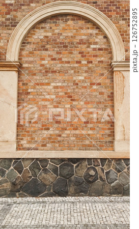 Architectural detail showing brick wall, stone pavement, and cobblestones in prague vysehrad copy space Architectural detail showing brick wall, stone pavement, and cobblestones in prague vysehrad copy space 126752895