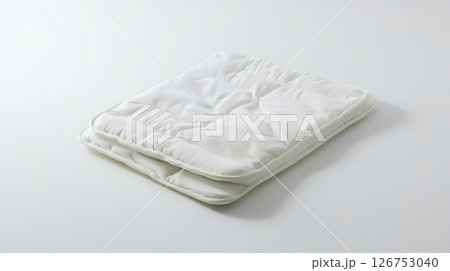 A white blanket with a pattern on it 126753040