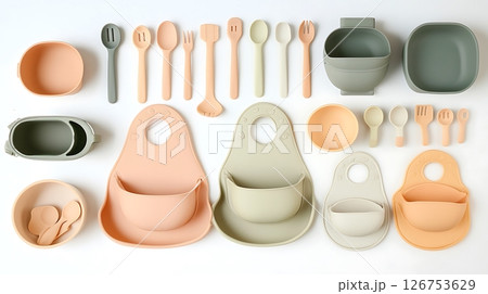 A collection of baby food and feeding utensils A collection of baby food and feeding utensils 126753629