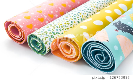 A row of colorful rolls of paper with different patterns and designs A row of colorful rolls of paper with different patterns and designs 126753955