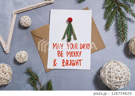 Christmas tree Craft Christmas greeting card holiday present. Tactile hand-on activity. Creative me-made gifts. Seasonal domestic life micro moment hobby 126754620