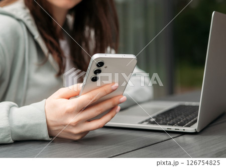 A person using a glucometer to check blood sugar levels, emphasizing healthcare, diabetes monitoring, and self-care practices. 126754825