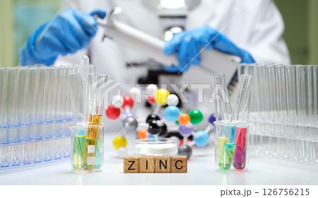 An intriguing laboratory scene showcases zinc alongside various exciting chemical experiments An intriguing laboratory scene showcases zinc alongside various exciting chemical experiments 126756215