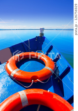 Blue boat sailing in Albufera lake of Valencia 126756929