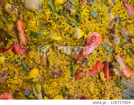 Spanish rice paella mixed of meat and seafood 126757004