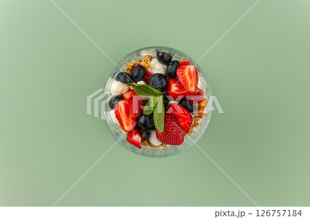 Portion of sweet layered desserd with berries Portion of sweet layered desserd with berries 126757184