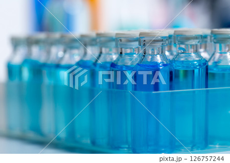 Chemical scientific laboratory blue glass bottles Chemical scientific laboratory blue glass bottles 126757244