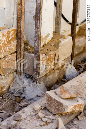 Masonry stone wall construcion process traditional 126757332