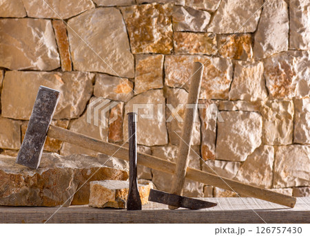 Hammer tools of stonecutter masonry work 126757430