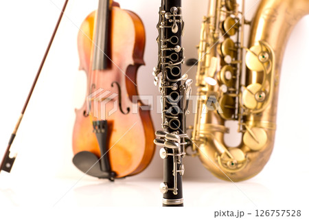 Sax tenor saxophone violin and clarinet in white 126757528