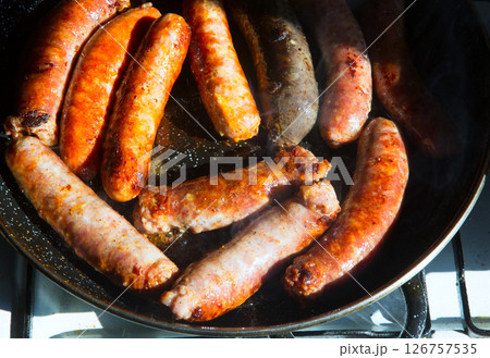 fried sausages sausages black pudding and chorizo fried sausages sausages black pudding and chorizo 126757535